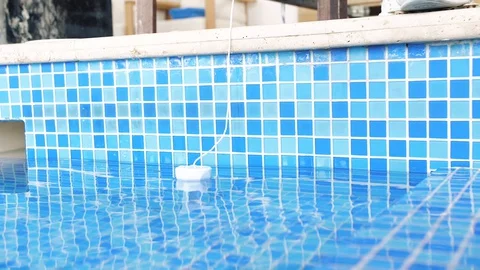 Man measures the temperature in the pool Stock Footage 127646141