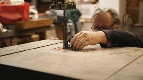 Man measuring band saw in workshop Stock Footage 102045404