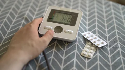 Man measuring blood pressure Stock Footage 338999006