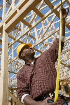 Man Measuring Construction Frame Stock Photos