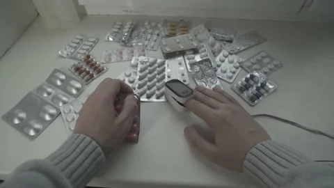 A man measuring oxygen in the blood. Point of View Shot. POV video. Video stock 237941305