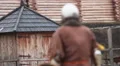 Man in medieval suit leaving battlefield, knight wins sword fighting tournament HD Footage
