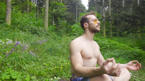Man meditating. Stock Footage 212379305