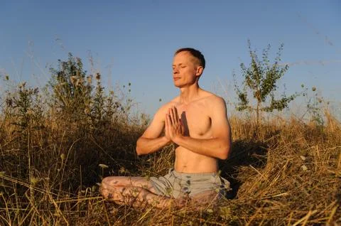 Man meditating Stock Photos