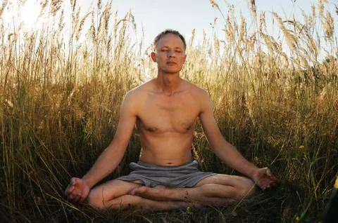 Man meditating Stock Photos