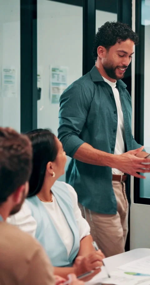 Man, meeting and folder for proposal pitch in office, team and happy speaker for Stock Footage 335921038