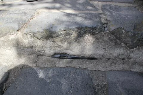 Man Meets Nature with Cabling embedded in Stone Stock Photos