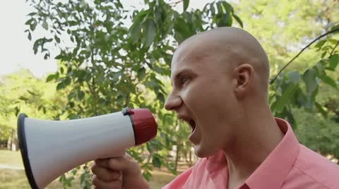 Man with a megaphone Stock Footage 20470782