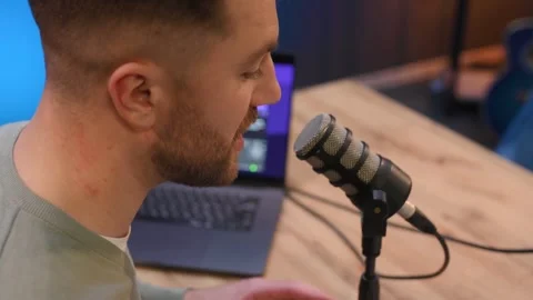 Man with microphone in the studio, conception of podcast. Video stock 297674319