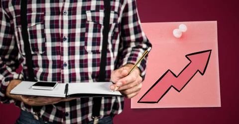 Man mid section with notebook against maroon background with pink sticky note Fotos de archivo
