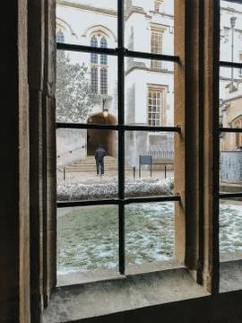 Man in the middle of the courtyard. Stock Photos