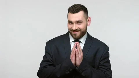 Man miling slyly, having cunning plan, sly expression. Stock Footage 159626184