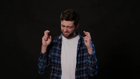 A Man Mimicing Against a Black Background Stock Footage 88415974