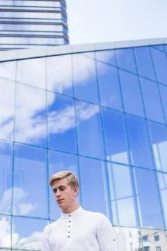 Man on a mirror building background Stock Photos