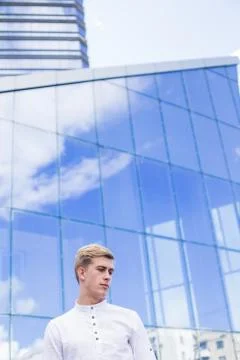 Man on a mirror building background Stock Photos