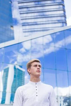 Man on a mirror building background Stock Photos