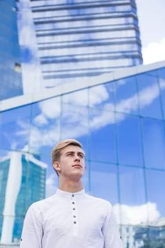 Man on a mirror building background Stock Photos