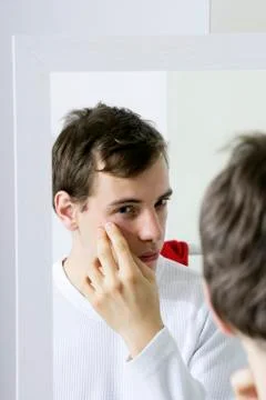 Man with mirror Stock Photos