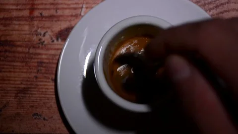 Man mixes coffee Stock Footage 79601603