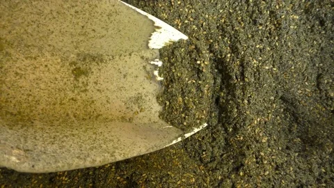 A man mixes middle eastern Mediterranean Zaatar spice and herb blend Видео 70447281