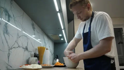 Man Mixing Ground Meat Stock-Footage 311599918