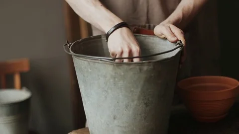 Man Mixing Soil For Planting Stock Footage 78057770