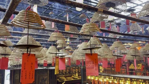 Man Mo Temple, Hong Kong, with incense coils Video stock 304552559
