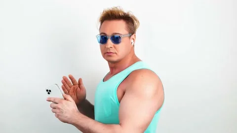 Man, mobile cell phone, dance in headphones Stock Footage 239455470