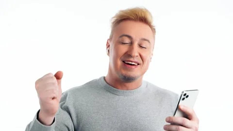 Man, mobile cell phone, dance in headphones for entertainment, streaming service Video stock 241262278