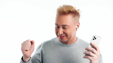 Man, mobile cell phone, dance in headphones for entertainment, streaming service Stock Footage 244869094