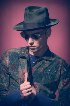 Man model, looking down, hat fashion photography Stock Photos