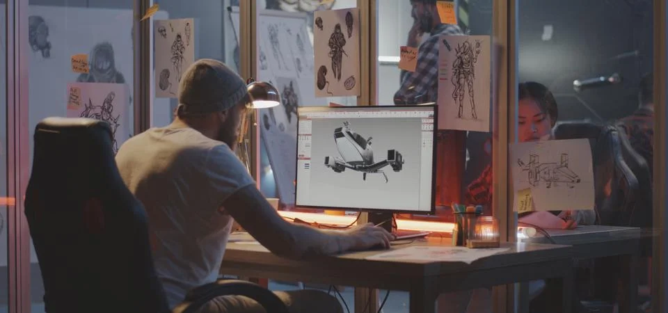 Man modeling an airplane on computer Stock Photos