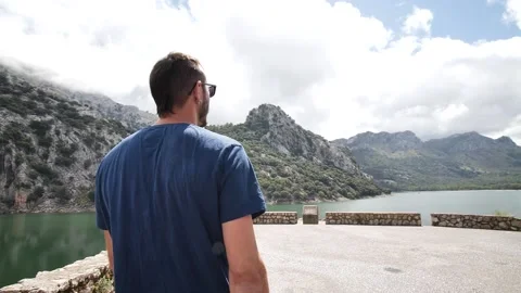 Man modeling in mountain landscape HD 1 Stock Footage 139982832