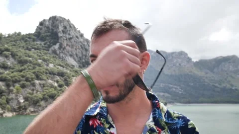 Man modeling in mountain landscape HD 7 Stock Footage 139983184