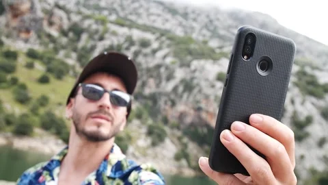 Man modeling in mountain landscape HD 11 Stock Footage 139983273