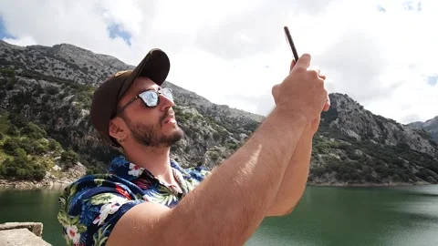 Man modeling in mountain landscape HD 10 Stock Footage 139983276