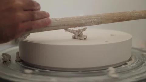 Man modeling plaster cast pottery with ceramic tools slow motion Video stock 79837735