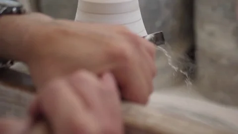 Man modeling plaster cast pottery with ceramic tools slow motion Stock Footage 80021827
