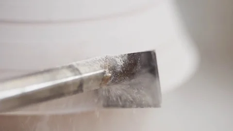 Man modeling plaster cast pottery with ceramic tools slow motion Stock Footage 80021870