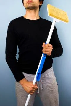 Man with mop Photos