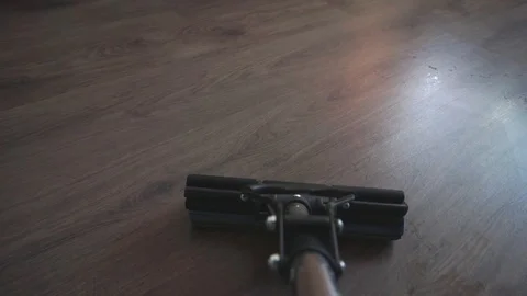 Man mopping the floor Stock Footage 86682969