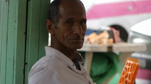 Man in Morocco looking at the camera, closeup, africa in 4K Stock Footage 91861426