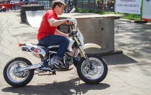 The man on motobike. Stock Photos