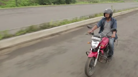 Man on motor cycle in India Stock-Footage 55432371
