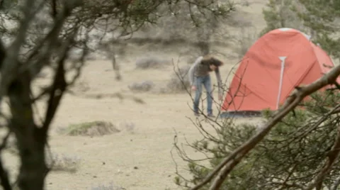 Man mount curtain in forest 動画素材 64574883