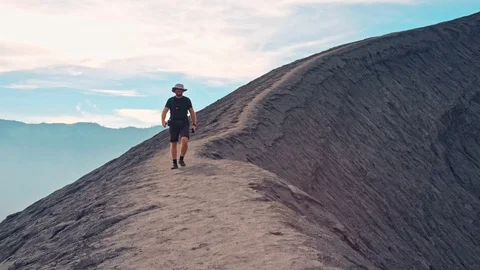 Man on mountain ridge Stock Footage 86749253