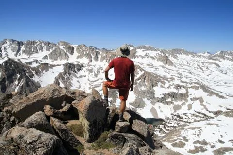 Man on mountain top Stock Photos