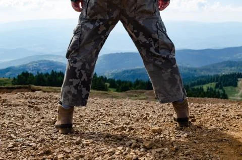 Man on a mountain top Stock Photos