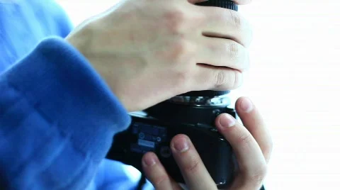 Man mounting lens Stock Footage 570007