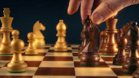 Man Moves Queen During Chess Game Stock Footage 310894179